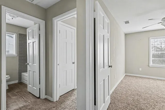 a view of a bathroom with toilet