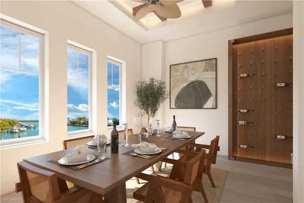 a view of a dining room with furniture window and outside view
