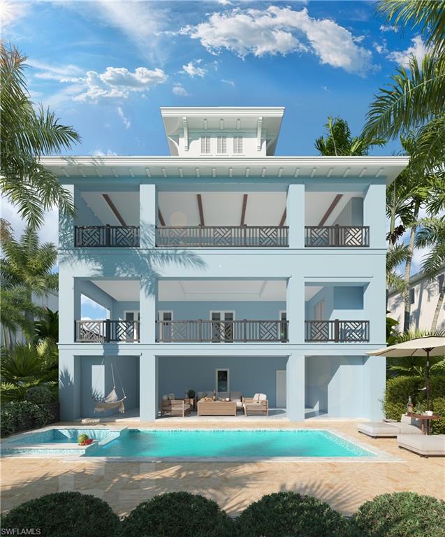 31 West Pelican Street Naples, FL 34113 - Photo 7 of 12 a front view of a house with garden