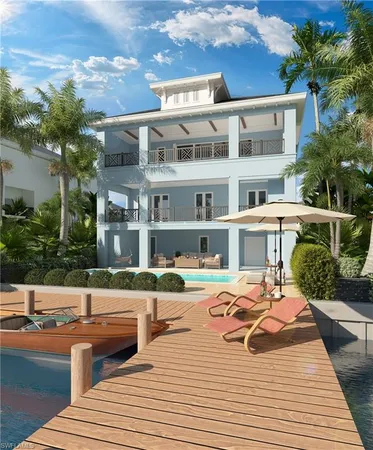 a view of a patio with couches potted plants and ocean view