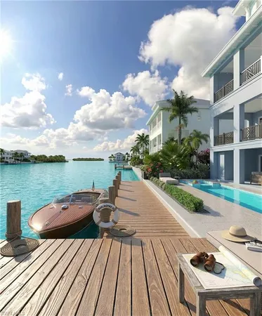 a view of balcony with wooden floor and lake view