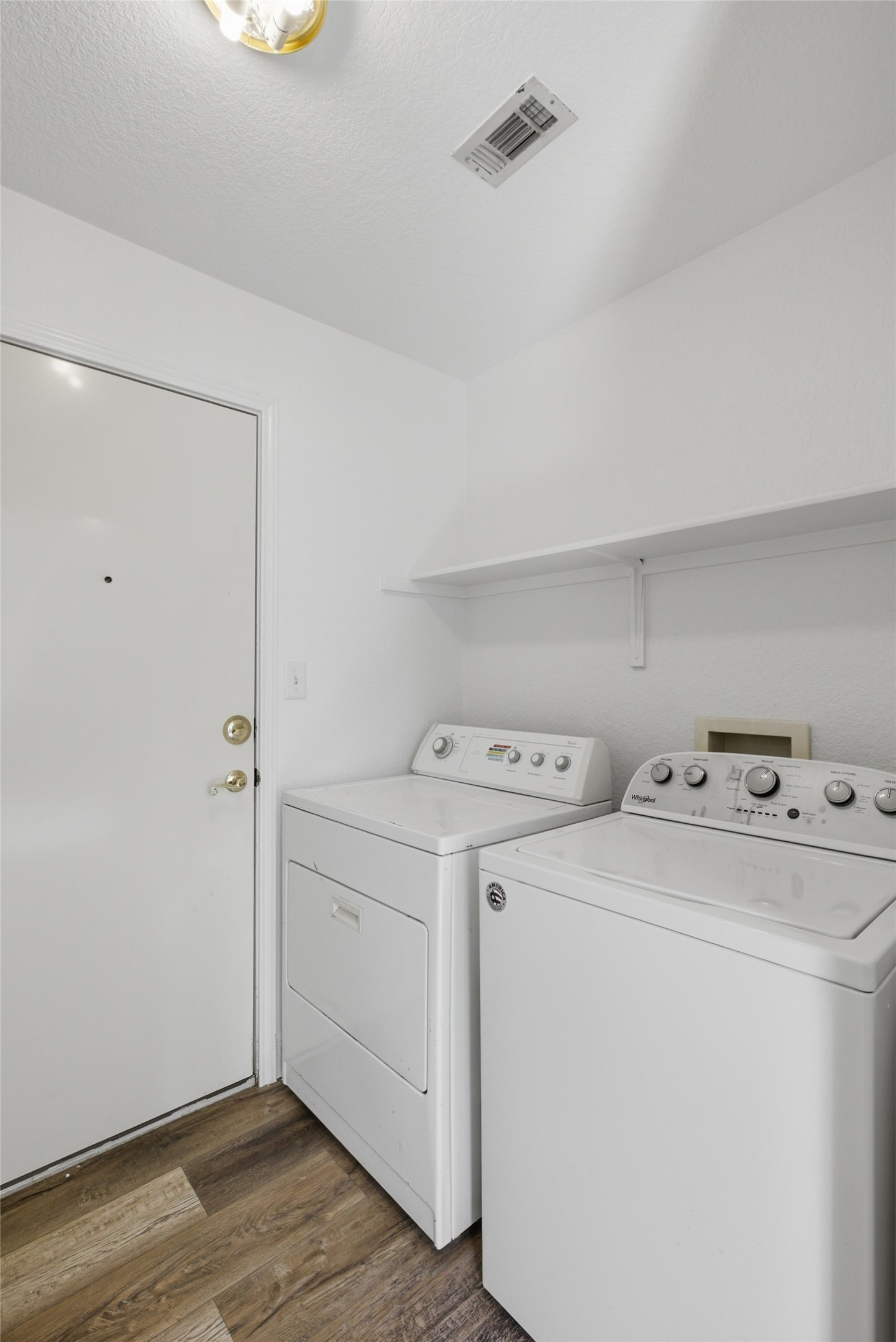 112 Prairie Springs Loop Georgetown, TX 78626 - Photo 15 of 23 a view of storage and utility room with washer and dryer