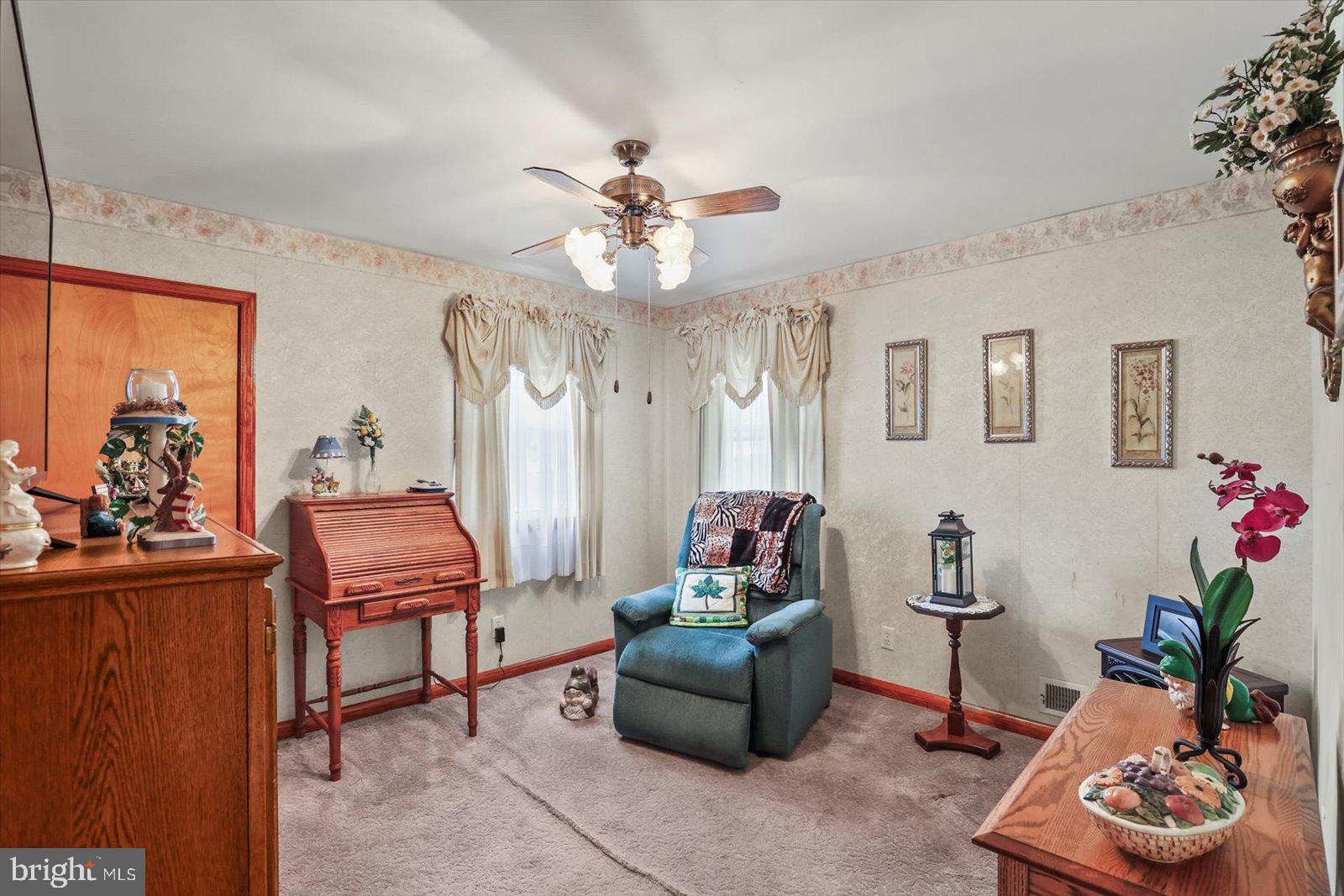 4817 East Joppa Road Perry Hall, MD 21128 - Photo 14 of 36 a living room with furniture and a potted plant