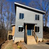 a house view with a outdoor space