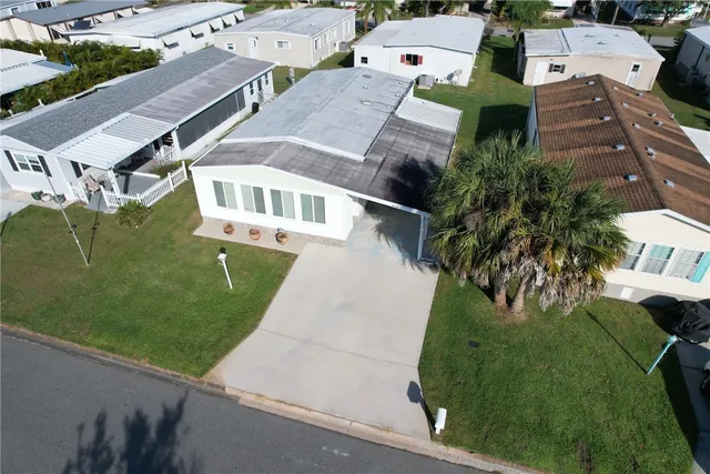 an aerial view of a house with a garden