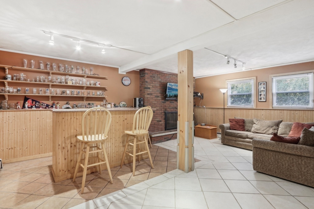 128 Harvard Road Stow, MA 01775 - Photo 18 of 36 a view of a dining room with furniture