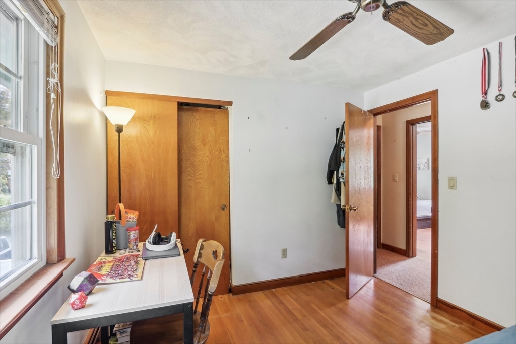 128 Harvard Road Stow, MA 01775 - Photo 23 of 36 a view of a room with furniture and wooden floor