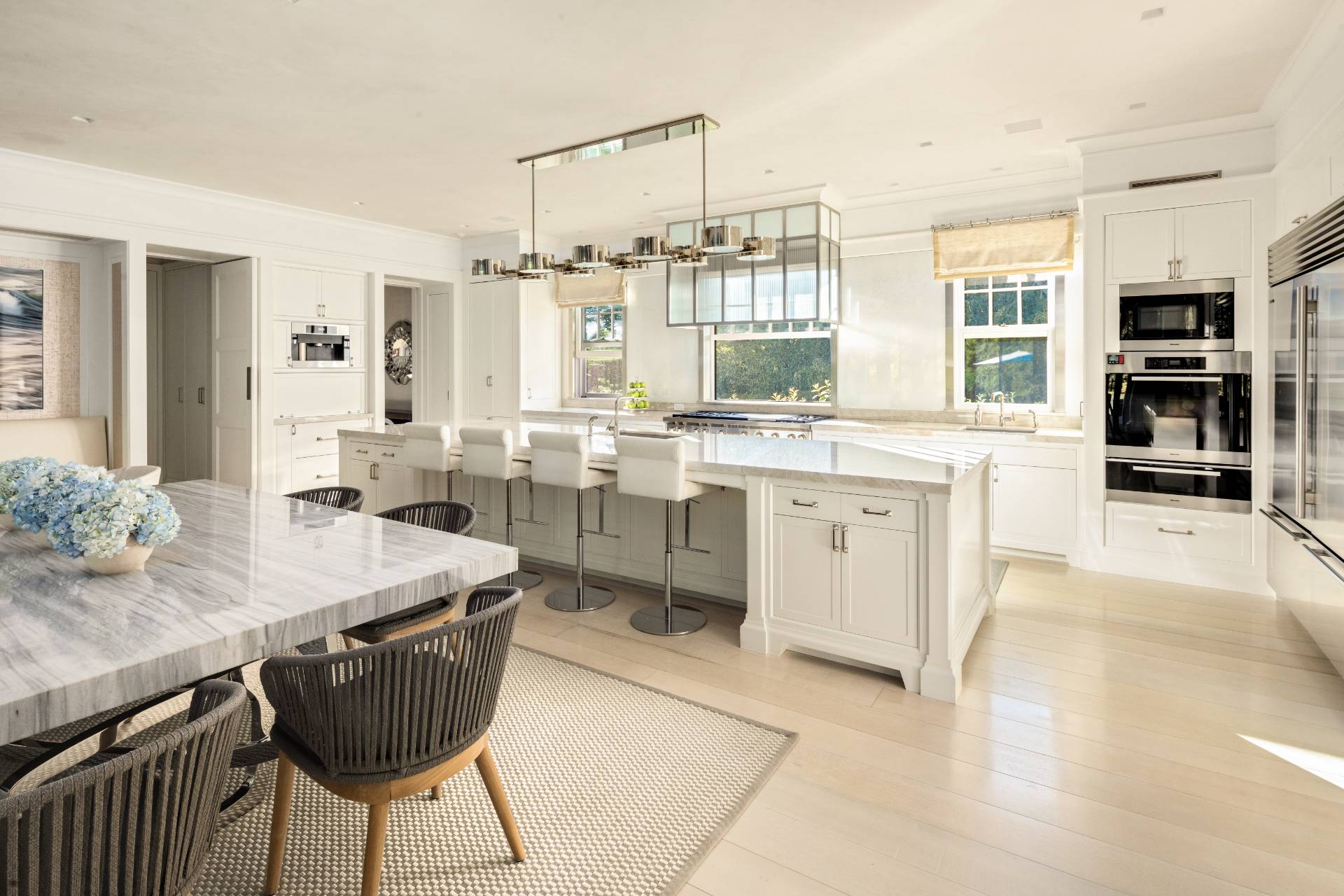 8 Hither Lane East Hampton, NY 11937 - Photo 11 of 38 a open kitchen with stainless steel appliances granite countertop a stove and a refrigerator