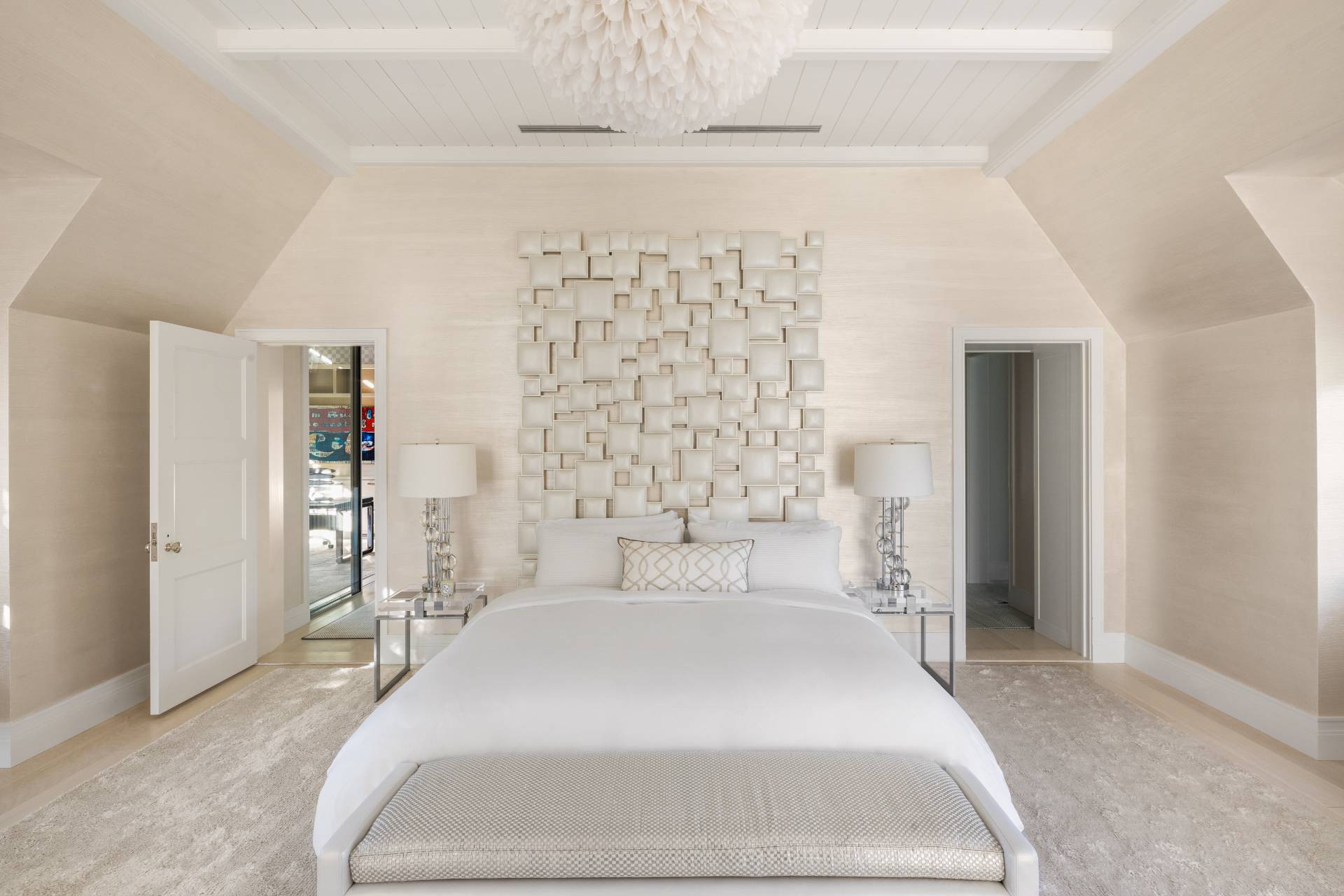 8 Hither Lane East Hampton, NY 11937 - Photo 15 of 38 a spacious bedroom with a bed and a window