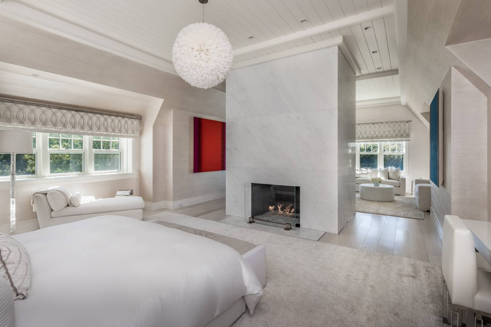 8 Hither Lane East Hampton, NY 11937 - Photo 16 of 38 a spacious bedroom with a large bed and a large window