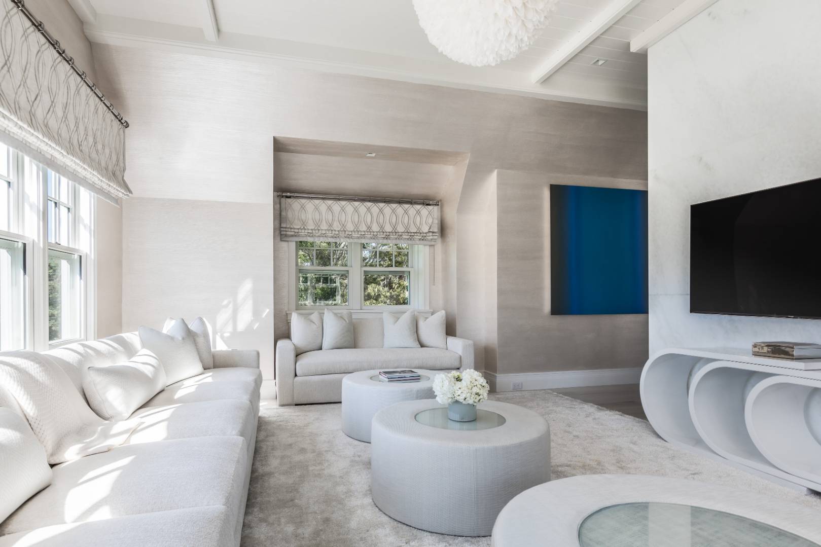 8 Hither Lane East Hampton, NY 11937 - Photo 17 of 38 a living room with furniture and a flat screen tv