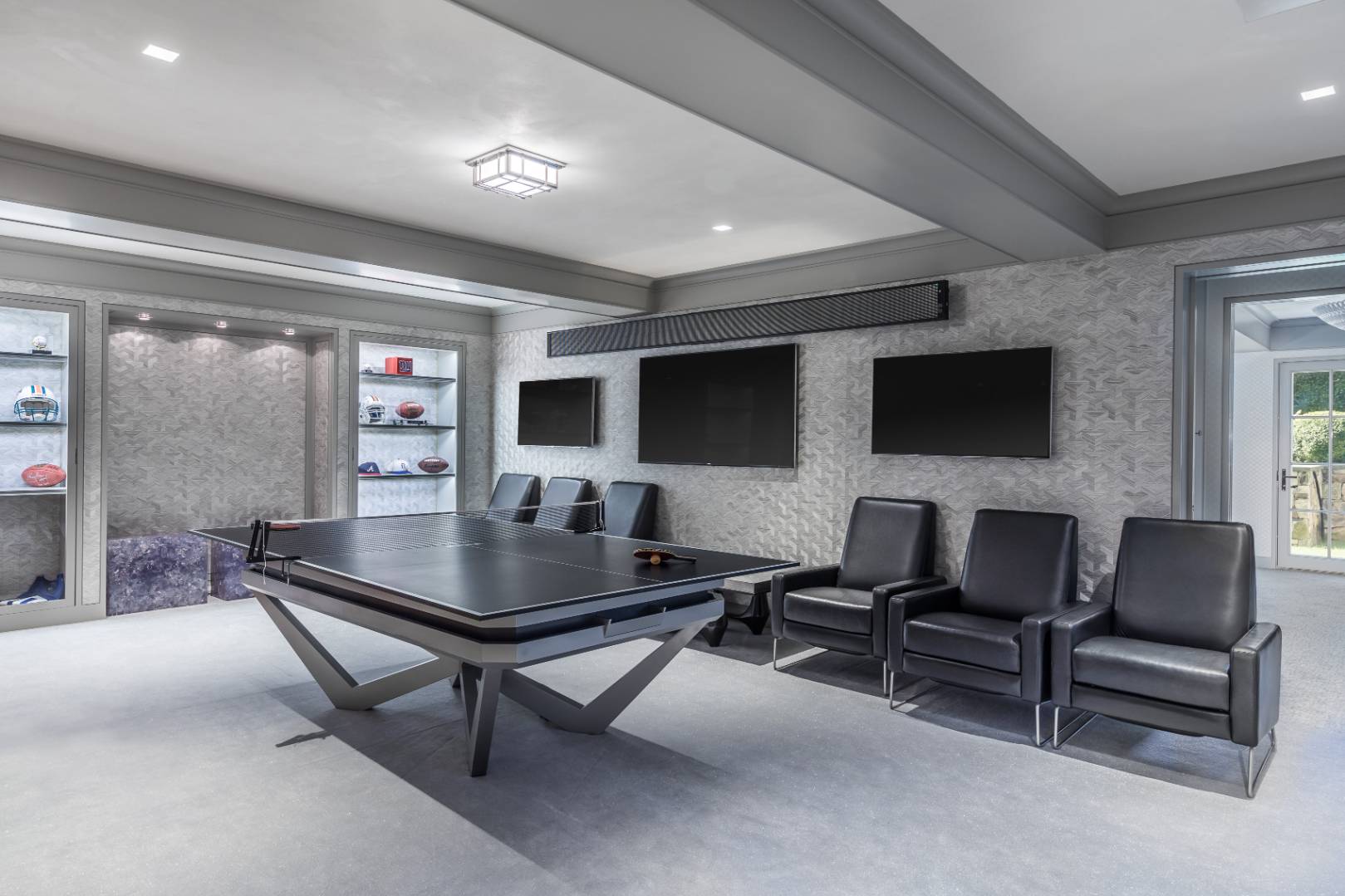 8 Hither Lane East Hampton, NY 11937 - Photo 27 of 38 a room with furniture and a flat screen tv