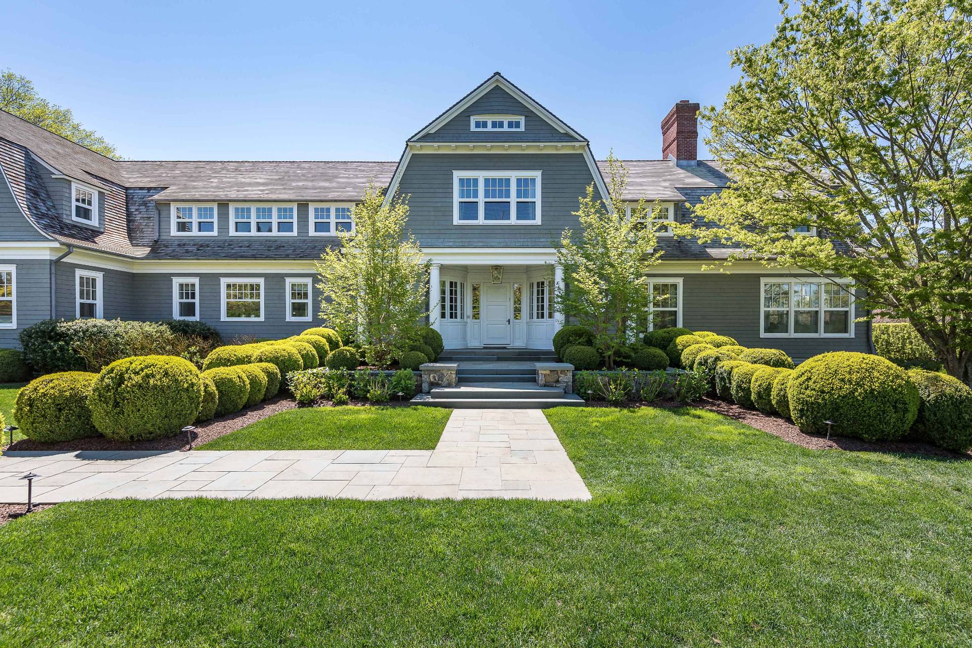 8 Hither Lane East Hampton, NY 11937 - Photo 36 of 38 a view of an apartment with a house and garden