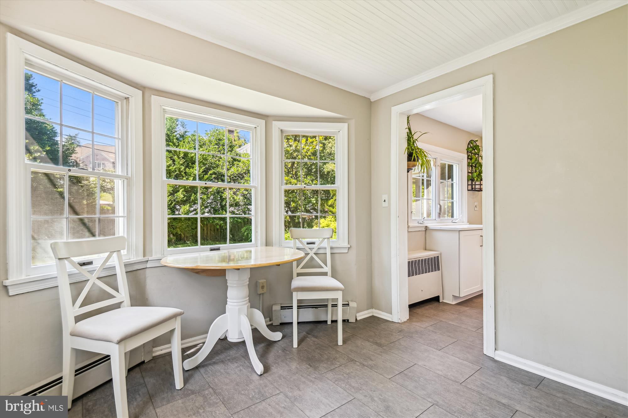 1402 Ruxton Road Baltimore, MD 21204 - Photo 10 of 32 Charming garden sunroom with so much natural light