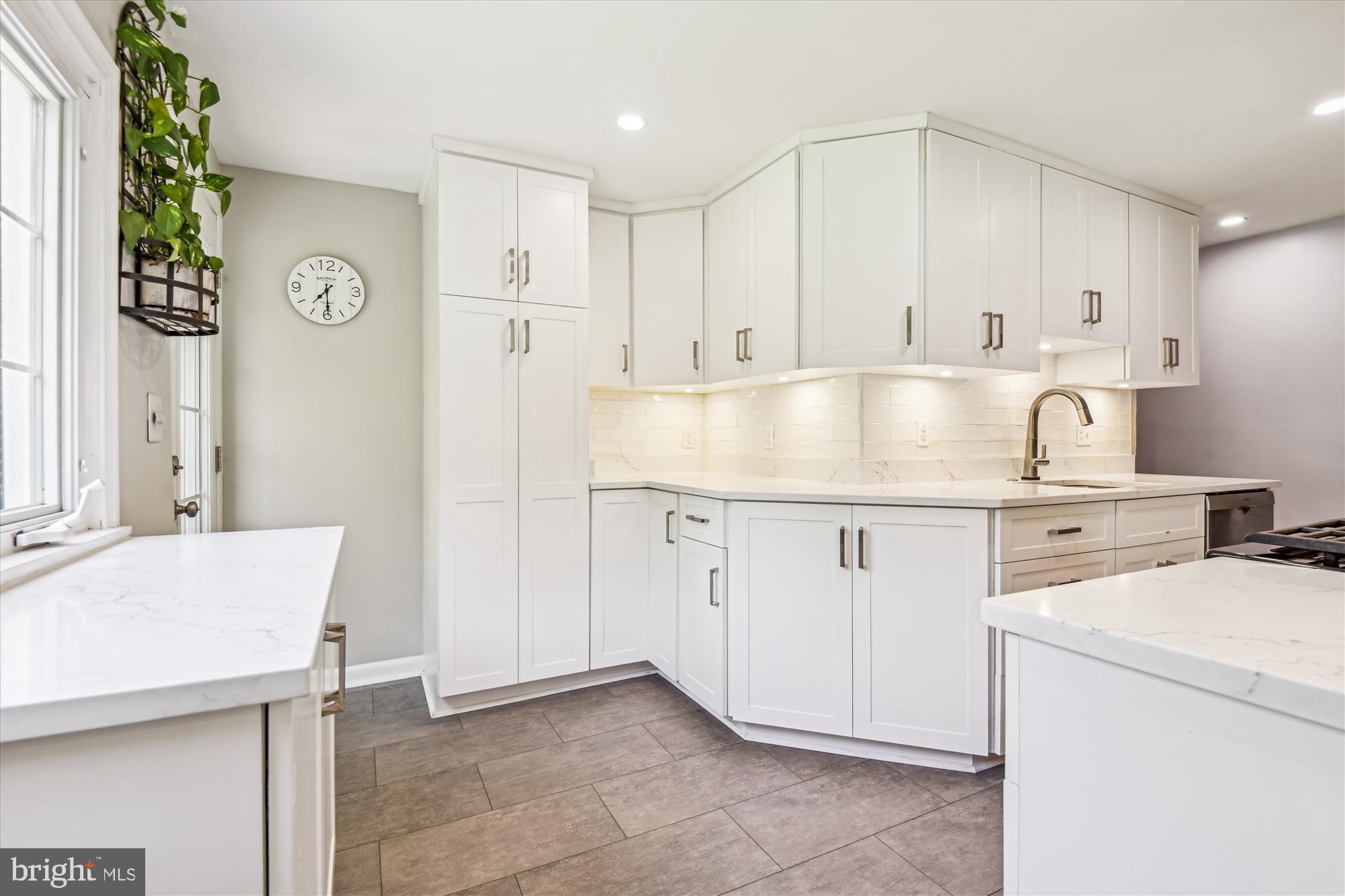 1402 Ruxton Road Baltimore, MD 21204 - Photo 8 of 32 New custom cabinetry, lighting, tile, and counters