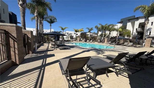 a view of a chairs and table on the terrace