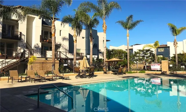 a view of a water fountain in front of city