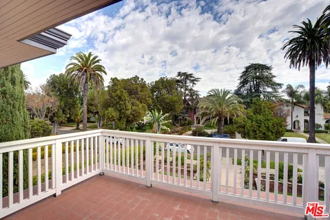 a view of a hallway with washer and dryer