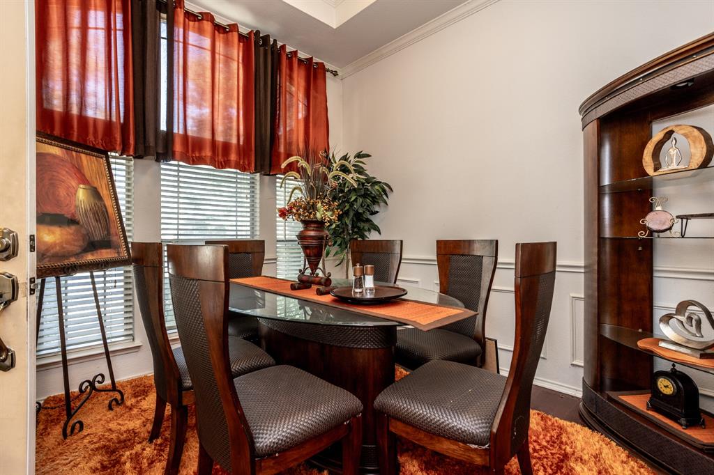 928 Trinity Drive Lancaster, TX 75146 - Photo 6 of 31 a dining room with furniture and window