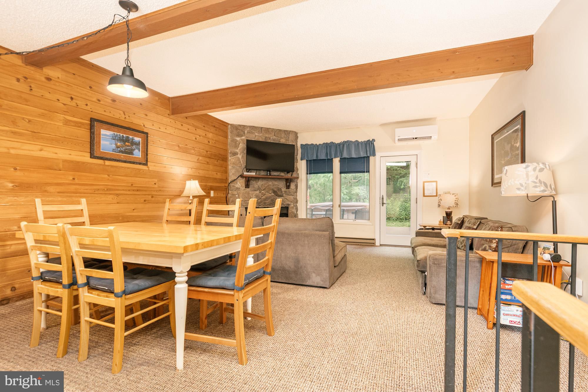 18 Winding Way, Unit 18D McHenry, MD 21541 - Photo 17 of 48 a dinning table and chairs in the patio