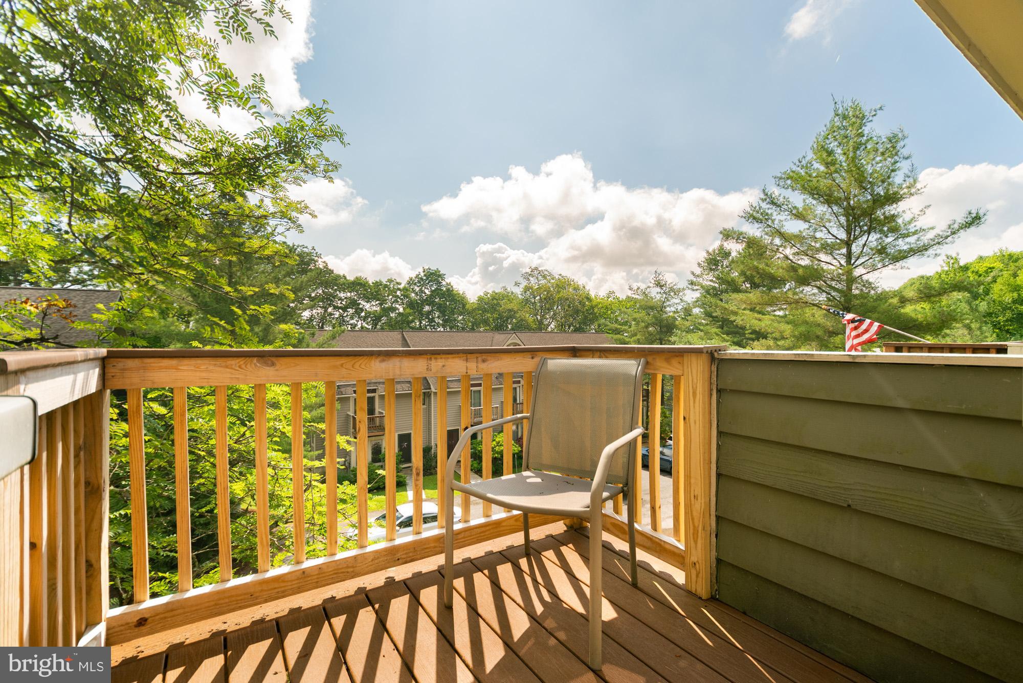 18 Winding Way, Unit 18D McHenry, MD 21541 - Photo 34 of 48 view of balcony with wooden floor and fence
