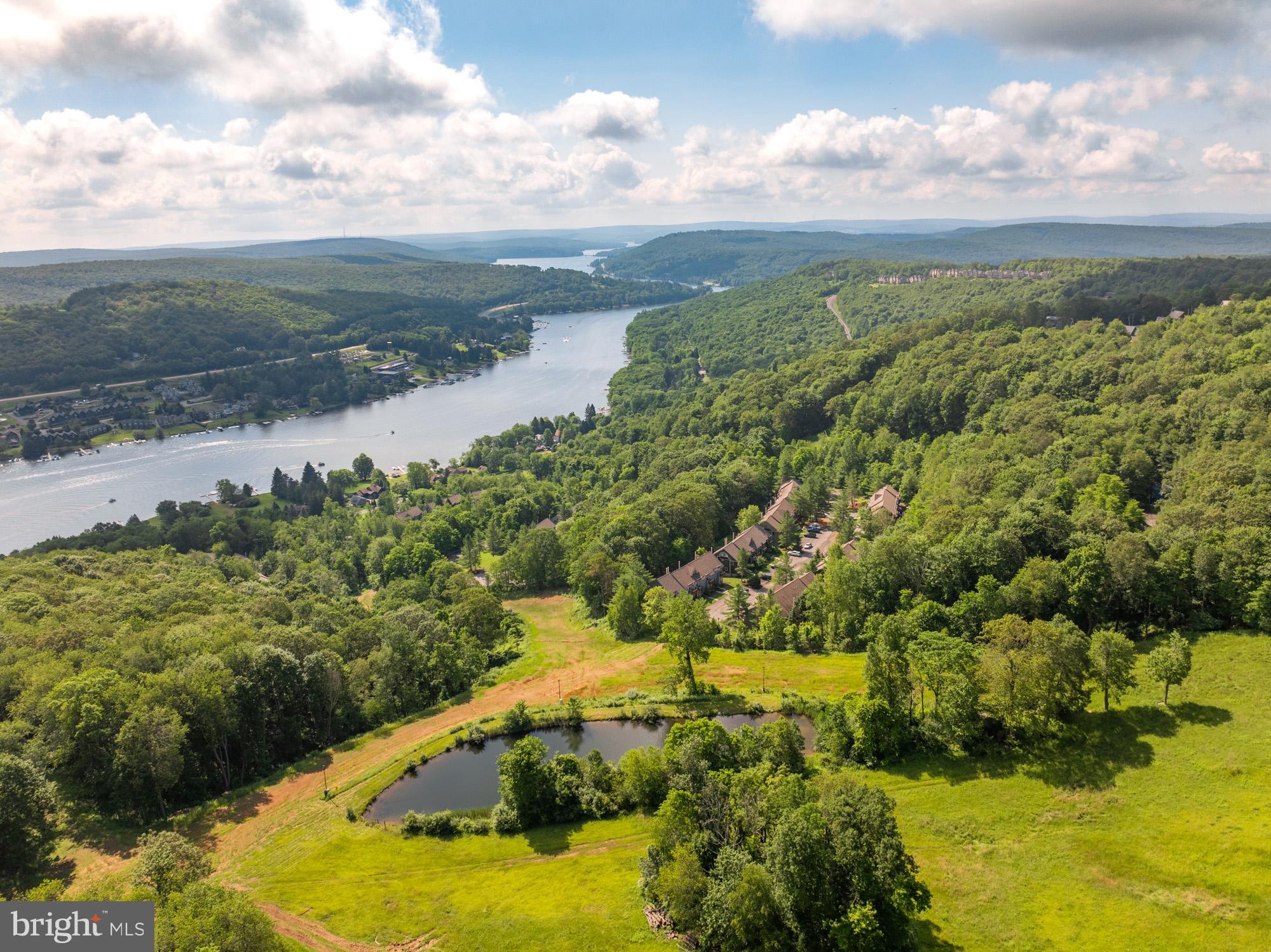 18 Winding Way, Unit 18D McHenry, MD 21541 - Photo 5 of 48 a view of lake with green space