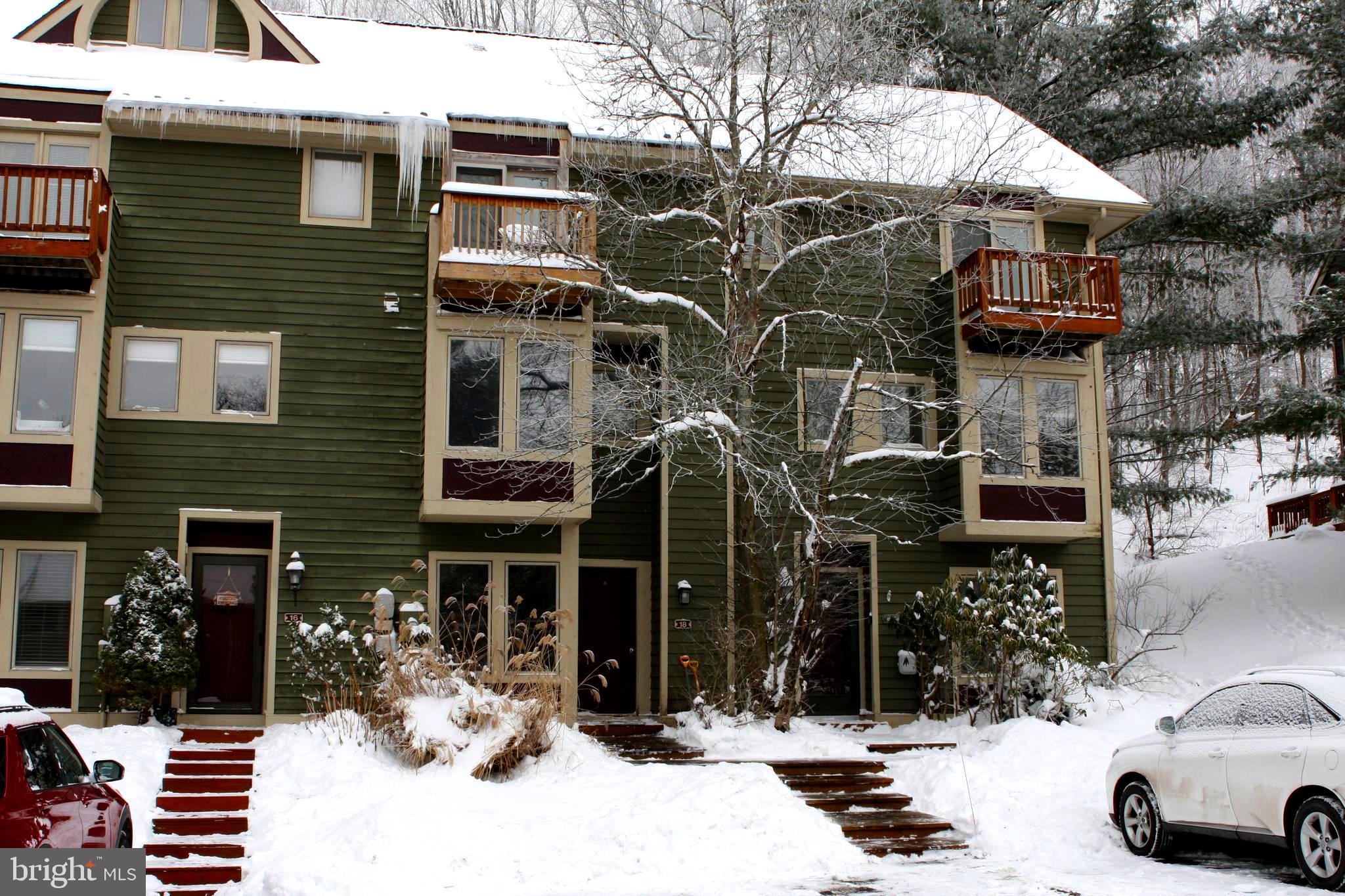 18 Winding Way, Unit 18D McHenry, MD 21541 - Photo 9 of 48 a front view of a building with street