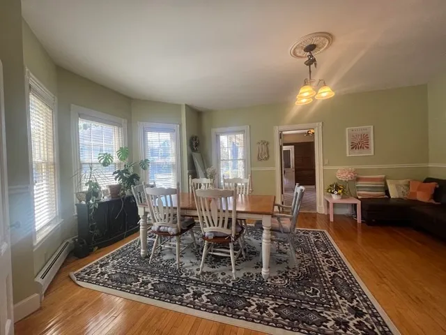 a view of a dining room with furniture