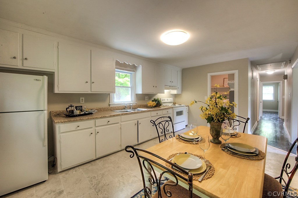 1267 Cardwell Road Crozier, VA 23039 - Photo 4 of 24 a kitchen with appliances a sink and cabinets