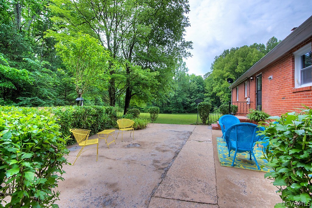 1267 Cardwell Road Crozier, VA 23039 - Photo 6 of 24 a view of a garden with potted plants