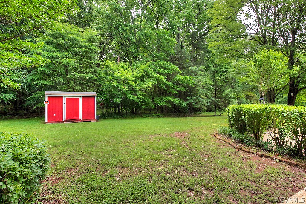 1267 Cardwell Road Crozier, VA 23039 - Photo 8 of 24 a view of a yard with a tree