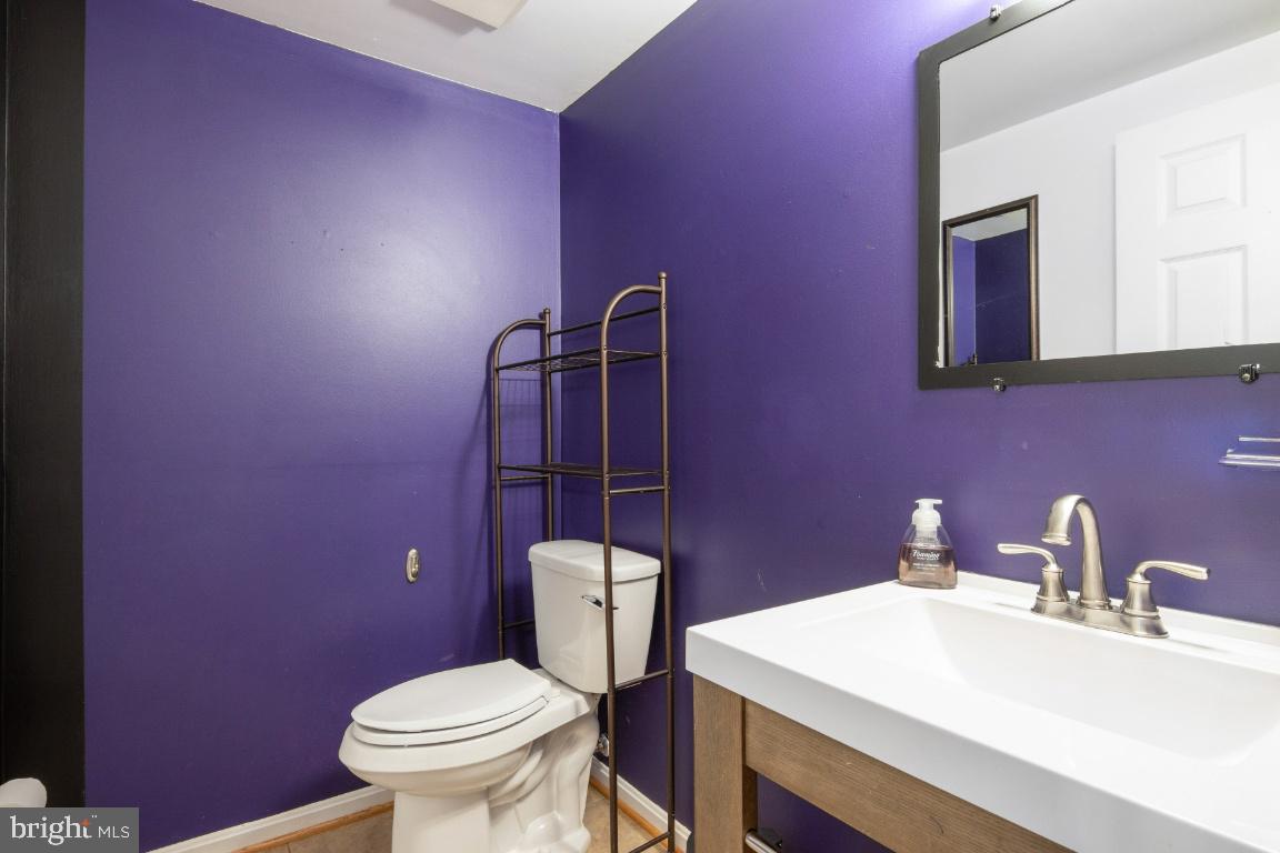 1067 Downton Road Baltimore, MD 21227 - Photo 33 of 47 Powder room on lower