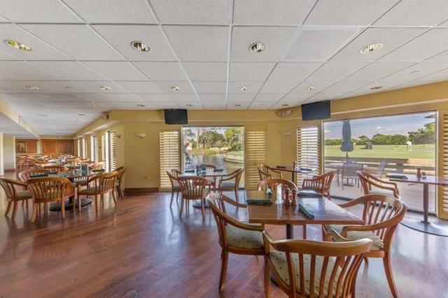 a view of a swimming pool with a patio