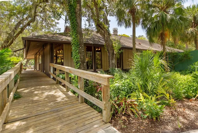 a view of a swimming pool with a yard