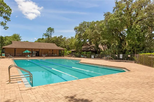a view of a backyard of the house