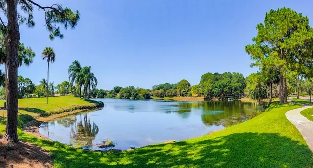 a view of outdoor space with signage and flags