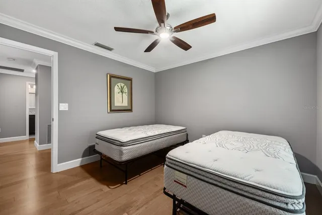 a room with a bed and a window