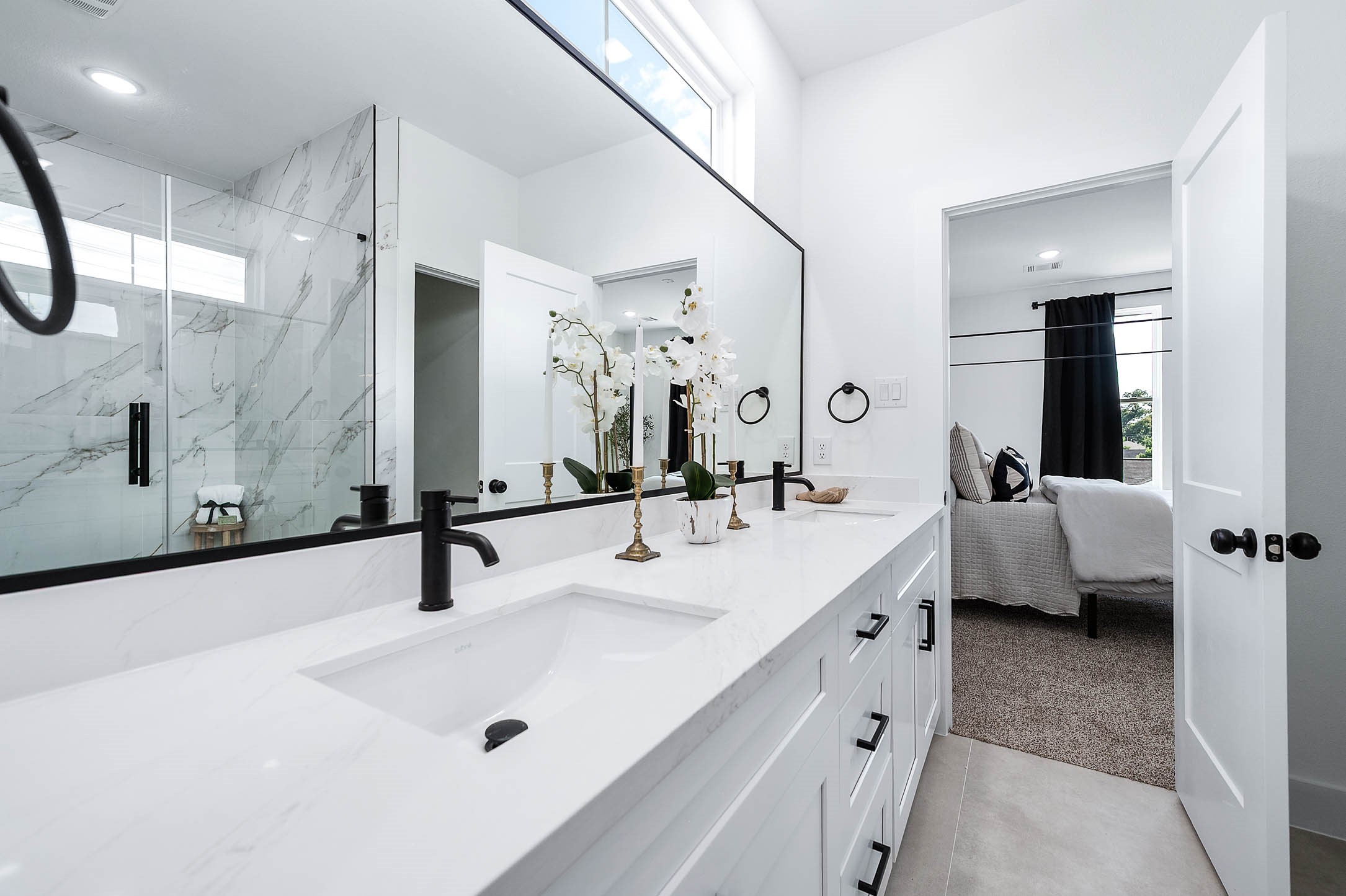 1515 Euel Street Houston, TX 77009 - Photo 28 of 34 Bright and beautifully designed vanity area with ample counter space, modern hardware, and a clean contemporary aesthetic.