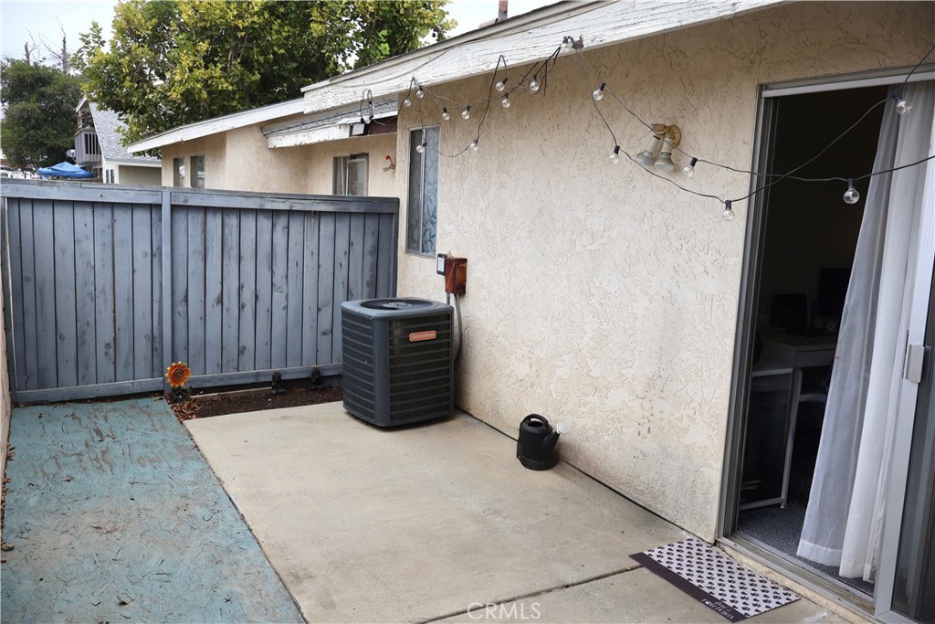 25929 Baylor Way Hemet, CA 92544 - Photo 11 of 21 a view of a house with wooden fence