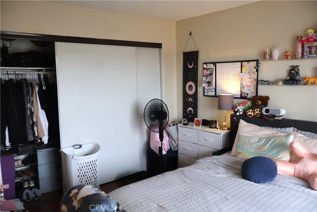 25929 Baylor Way Hemet, CA 92544 - Photo 15 of 21 a bedroom with furniture and a window