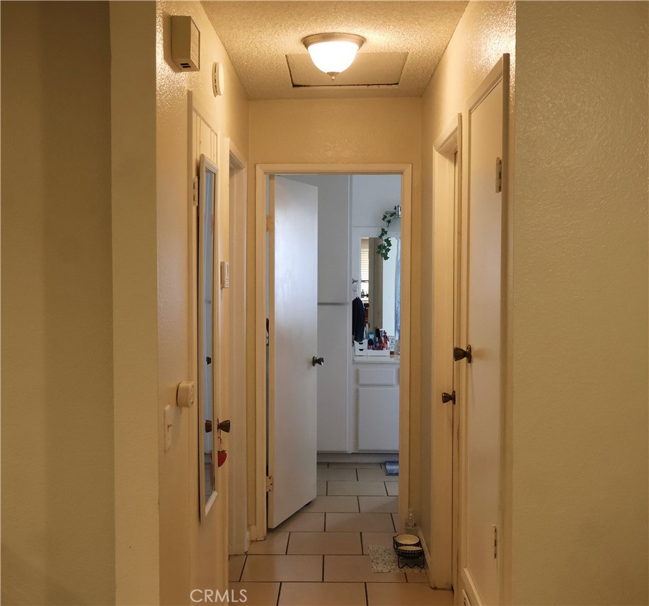 25929 Baylor Way Hemet, CA 92544 - Photo 21 of 21 a bathroom with a glass door shower
