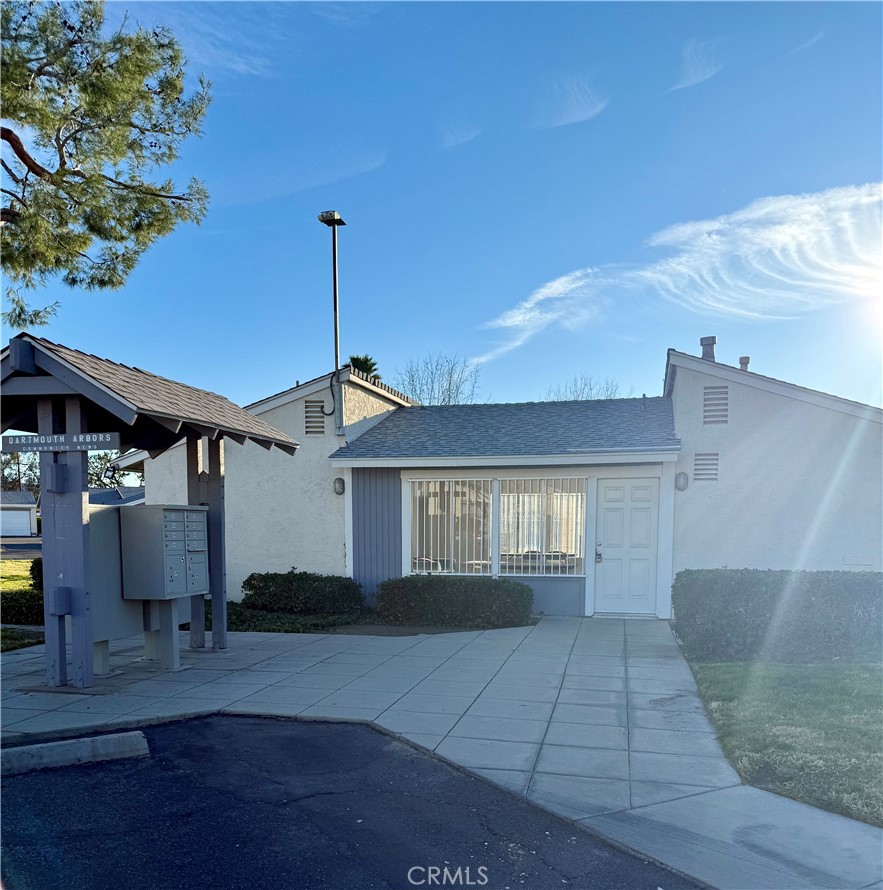 25929 Baylor Way Hemet, CA 92544 - Photo 6 of 21 a front view of a house with a yard