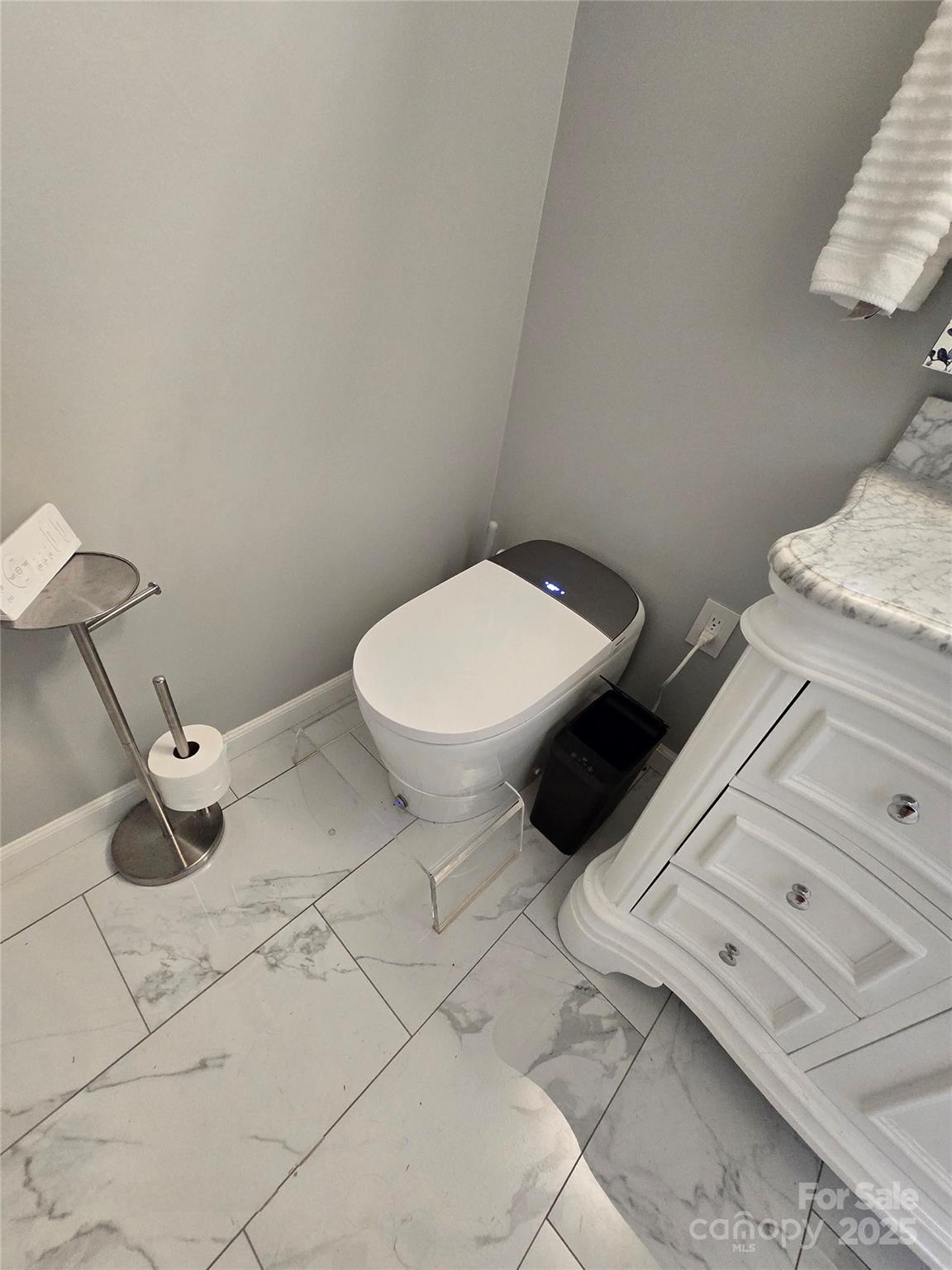 5202 Robin Lane Randleman, NC 27317 - Photo 12 of 48 a bathroom with a toilet and a rug