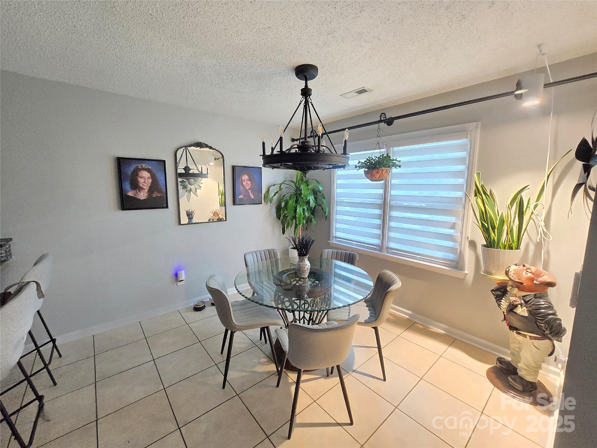 5202 Robin Lane Randleman, NC 27317 - Photo 22 of 48 a dining room with furniture and window