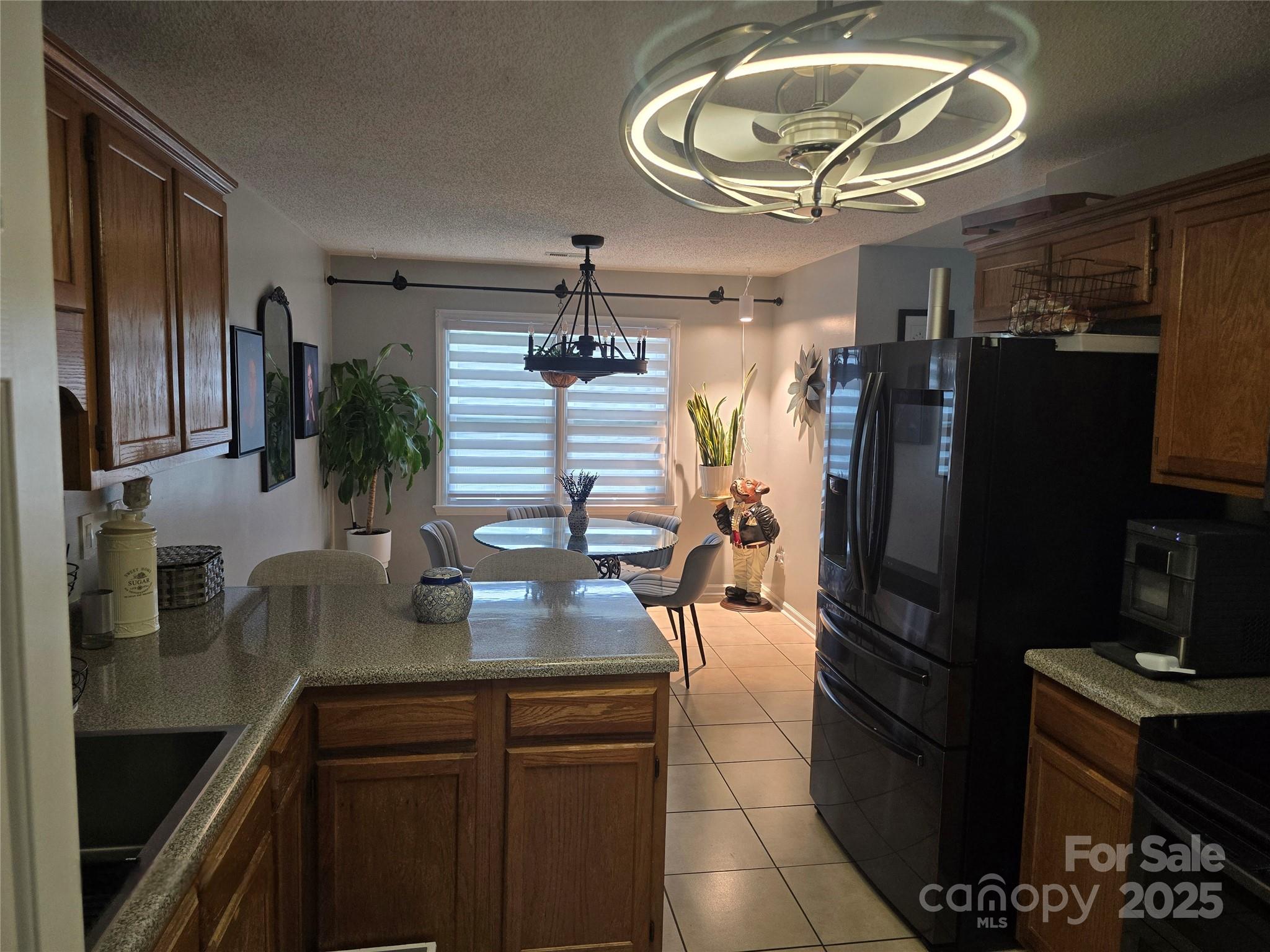 5202 Robin Lane Randleman, NC 27317 - Photo 26 of 48 a kitchen with a refrigerator and countertop