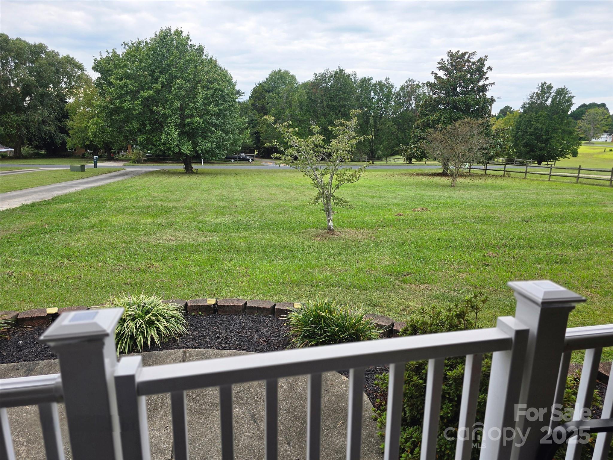 5202 Robin Lane Randleman, NC 27317 - Photo 32 of 48 a view of a garden with an outdoor space