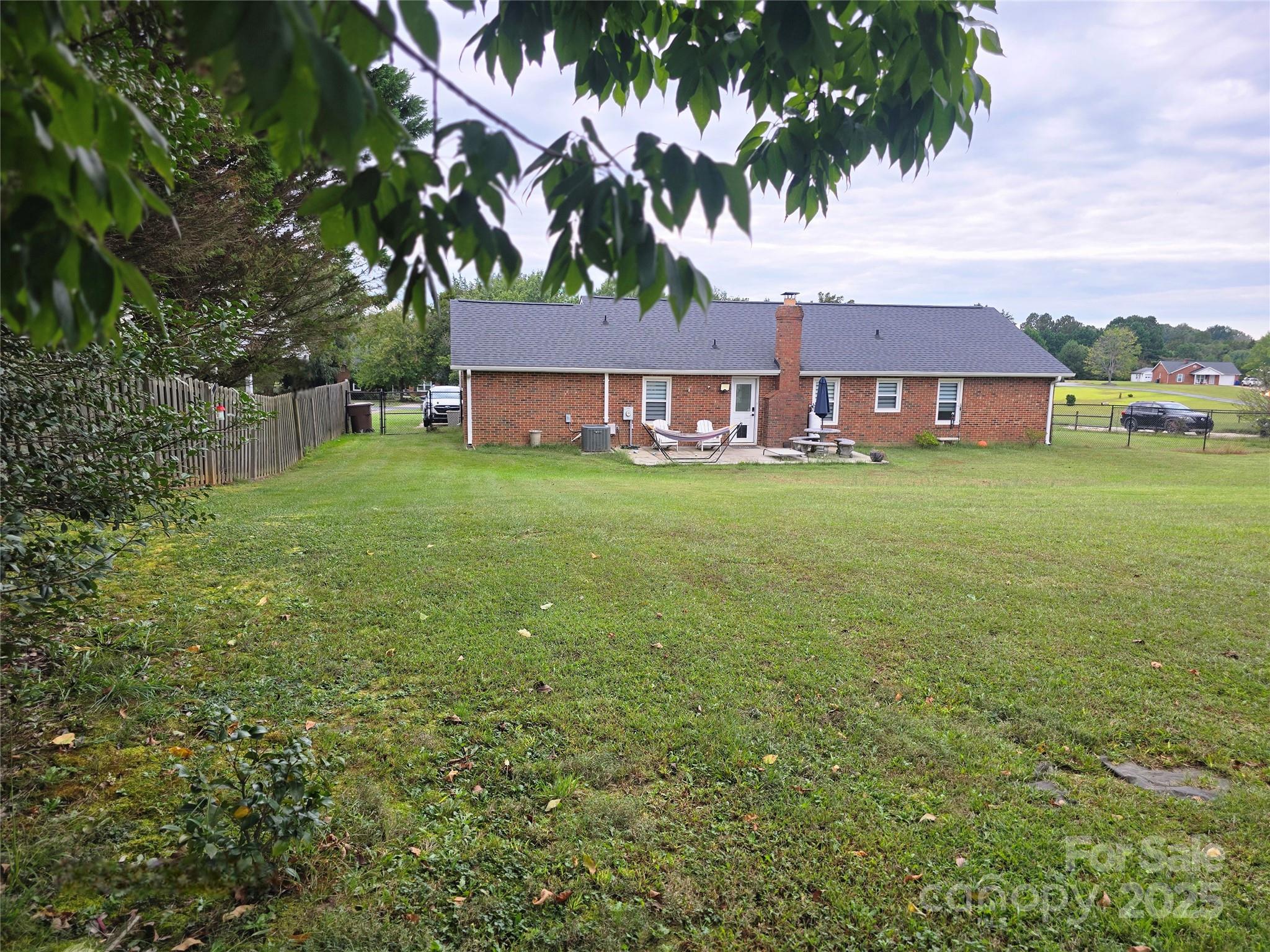 5202 Robin Lane Randleman, NC 27317 - Photo 42 of 48 a front view of a house with a garden