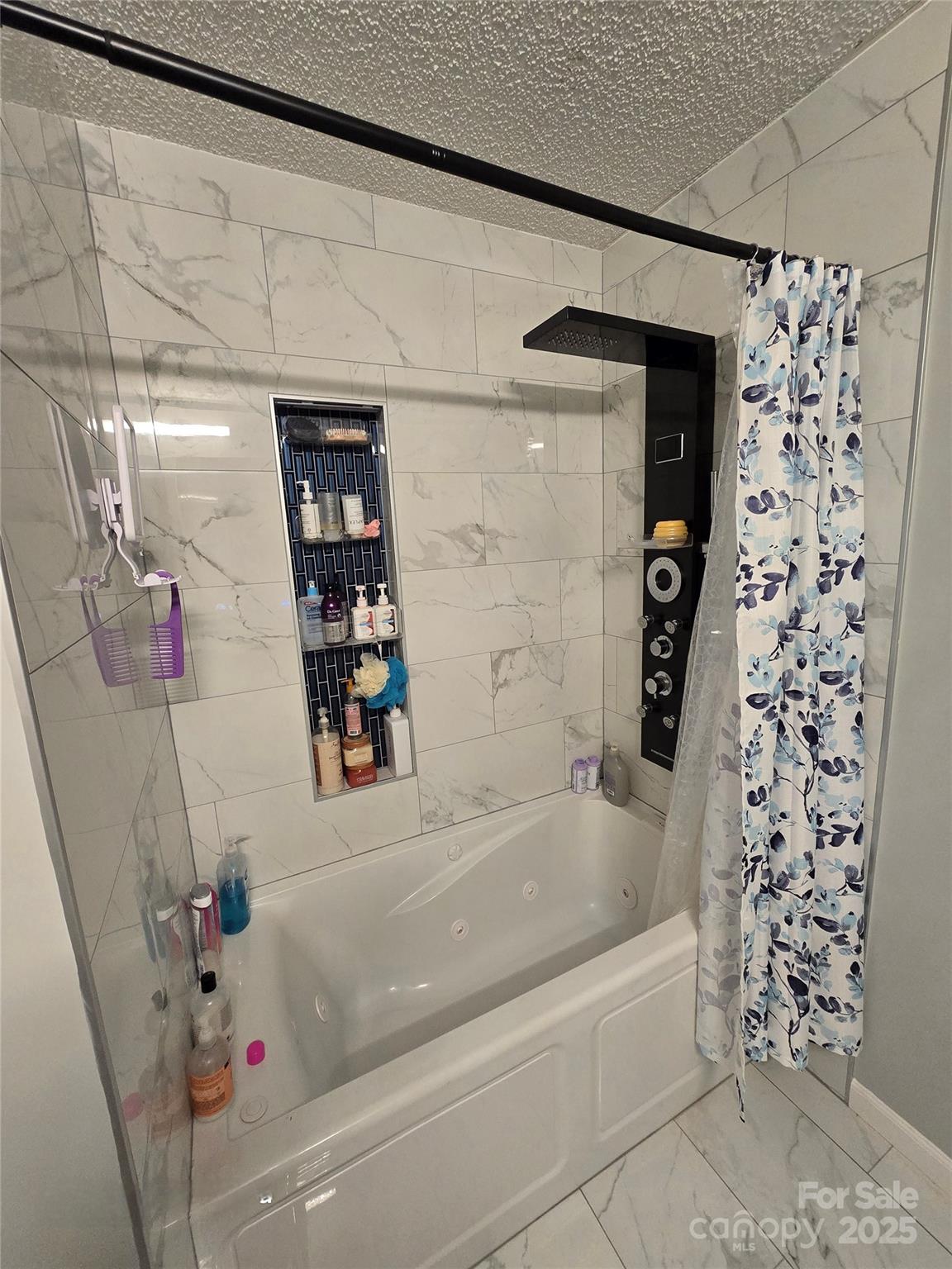 5202 Robin Lane Randleman, NC 27317 - Photo 10 of 48 a bathroom with a bathtub and shower