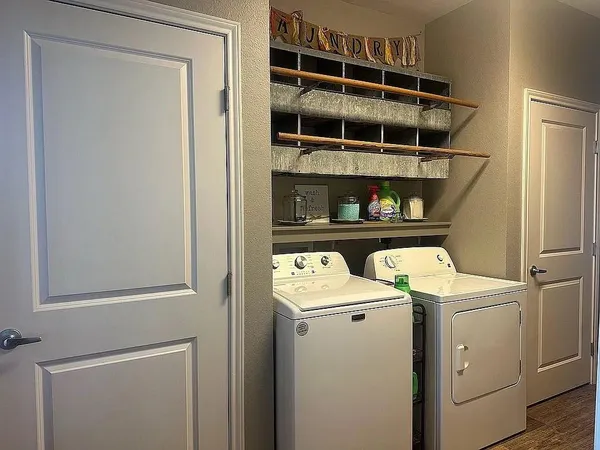 a utility room with dryer and washer