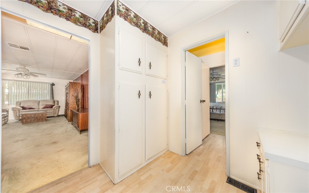 9401 Sharondale Road Calimesa, CA 92320 - Photo 16 of 23 a view of a hallway with rooms